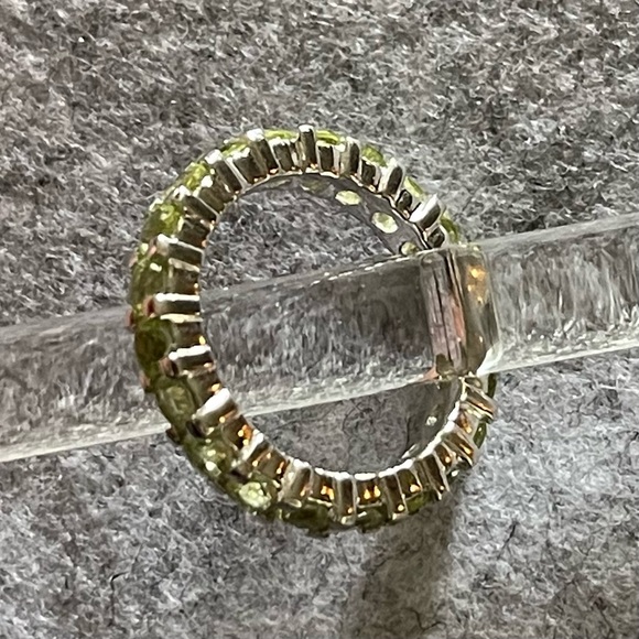 925 Sterling silver eternity ring band, possibly peridot.